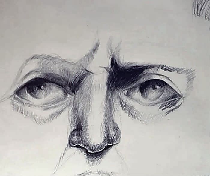 Boligrafo sobre papel. Los dos ojos y la nariz de un rostro, con las cejas muy cargadas de negro y un sombreado denso bajo los parpados.